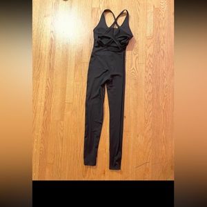 Forever 21 Black fitted jumpsuit criss cross mesh back size small